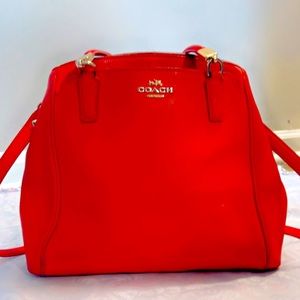 Three Coach purses. All of them are in great condition.